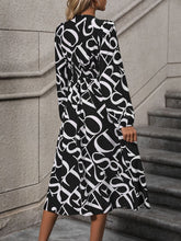 Load image into Gallery viewer, Printed V-Neck Long Sleeve Midi Dress
